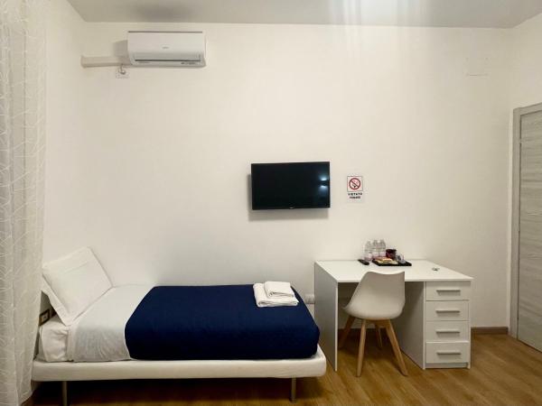 Nuovo Confortini Rooms SUNDAY : photo 4 de la chambre chambre triple
