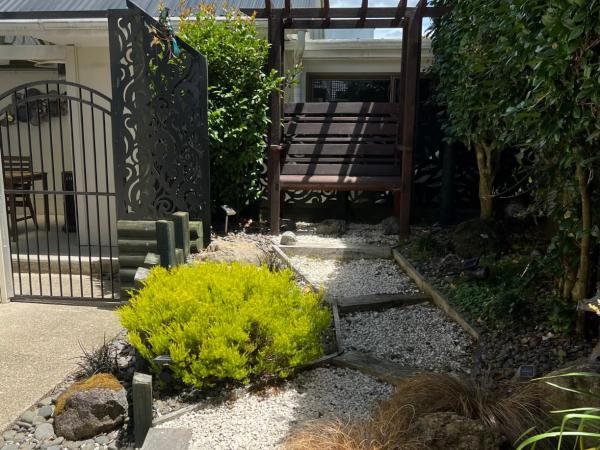 Carly's Place : photo 3 de la chambre chambre lit queen-size - vue sur jardin