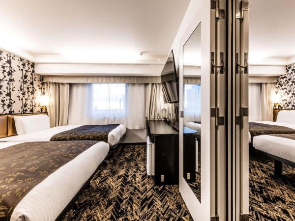 APA Hotel & Resort Osaka Umeda Eki Tower : photo 5 de la chambre chambre lits jumeaux communicante - non-fumeurs