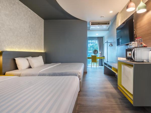 Qiu Hotel Sukhumvit SHA Plus : photo 2 de la chambre chambre triple deluxe