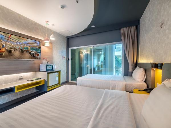 Qiu Hotel Sukhumvit SHA Plus : photo 3 de la chambre chambre triple deluxe