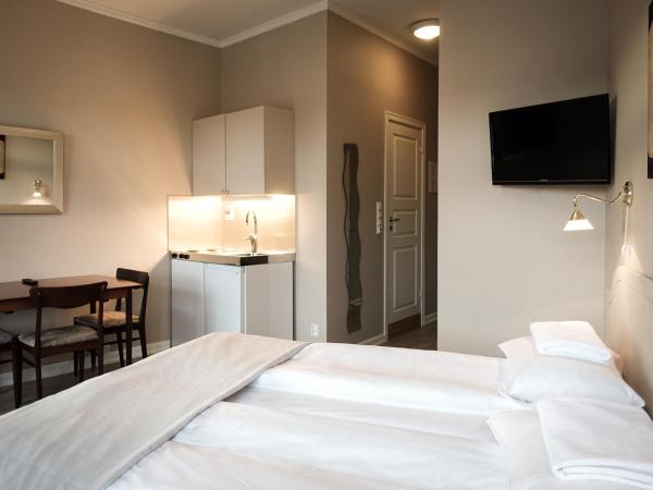 Cochs Pensjonat : photo 2 de la chambre chambre triple supérieure