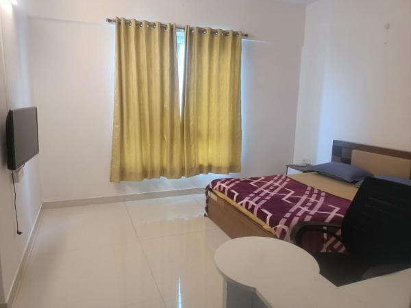 Royal Nest - Luxury Stay : photo 3 de la chambre chambre lit king-size deluxe