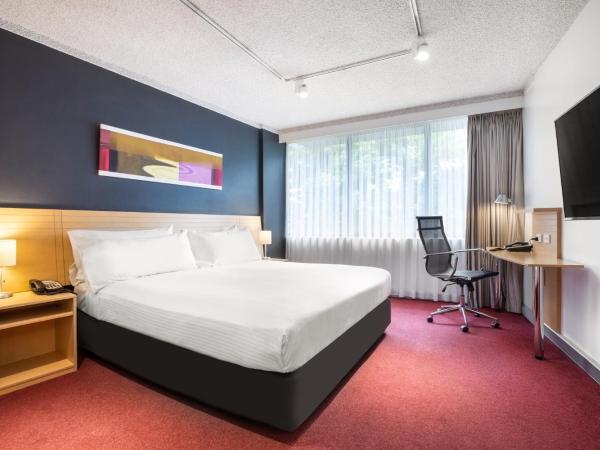 Holiday Inn Melbourne Airport, an IHG Hotel : photo 1 de la chambre hébergement standard avec 1 lit queen-size - accessible aux personnes à mobilité réduite