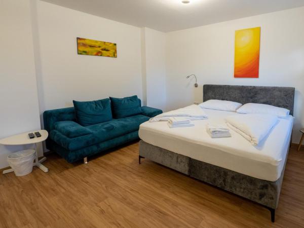 B&B Hotel Heimgartl : photo 4 de la chambre chambre quadruple