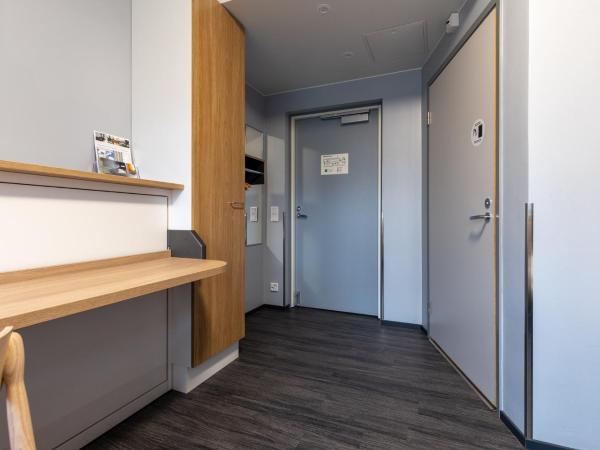 Hotel Linnasmäki : photo 1 de la chambre chambre lits jumeaux pour personnes à mobilité réduite
