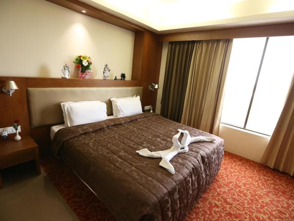 SilverCloud Hotel and Banquets : photo 2 de la chambre suite junior