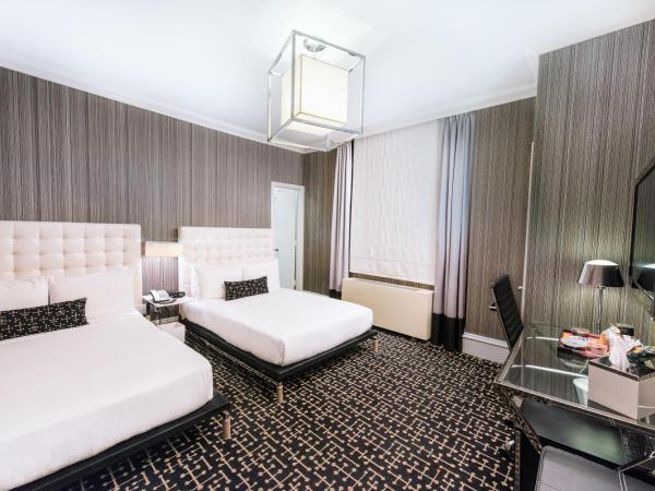 Moderne Hotel : photo 2 de la chambre chambre deluxe avec 2 lits doubles