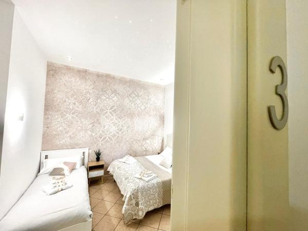 BARI ROOMS Abate Gimma : photo 3 de la chambre chambre triple basique avec salle de bains commune
