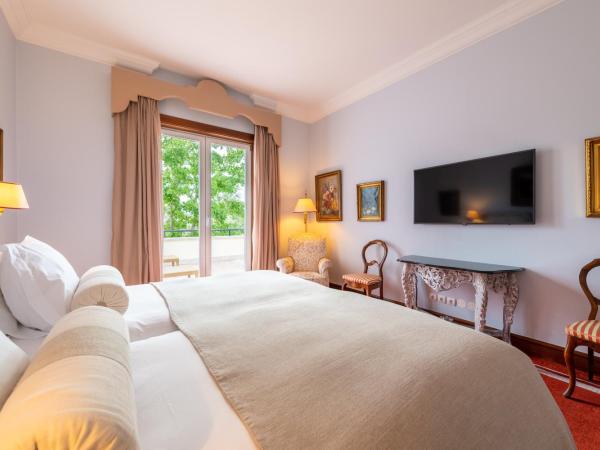 Pestana Palace Lisboa Hotel & National Monument - The Leading Hotels of the World : photo 5 de la chambre suite - vue sur jardin