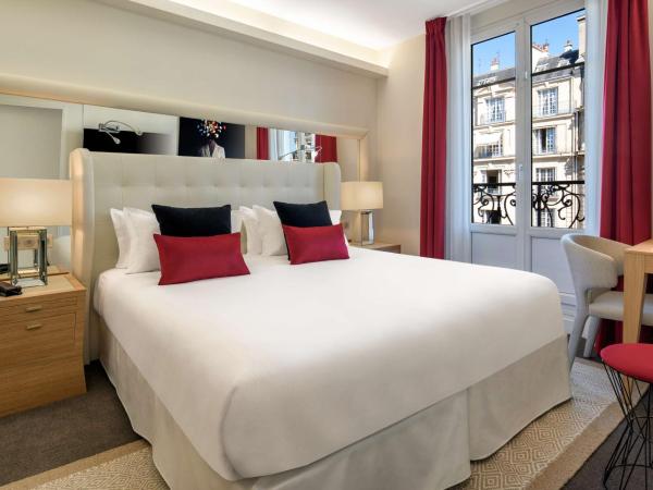 Hotel Camille Paris Tapestry Collection by Hilton : photo 1 de la chambre chambre lit king-size - vue sur ville