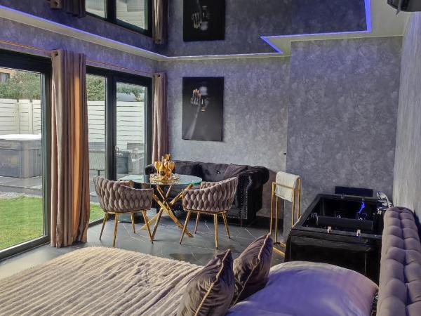 Pensjonat Wrzos : photo 3 de la chambre appartement - vue sur jardin