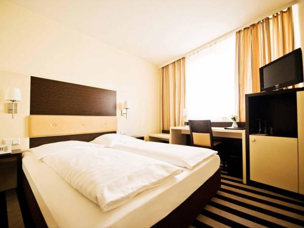 Bristol Hotel - Frankfurt City : photo 1 de la chambre petite chambre double