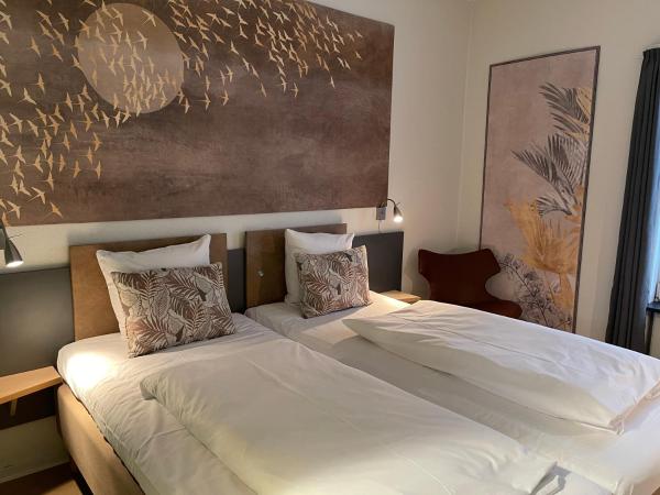 City Hotel Nattergalen : photo 4 de la chambre chambre double avec lit d'appoint