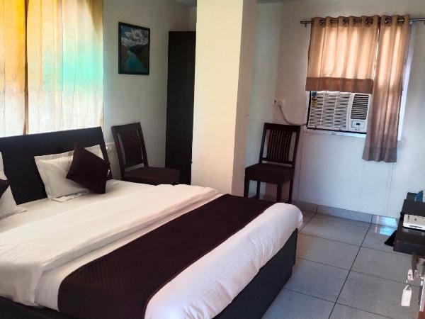 RANGBAARI STAYS & CAFE : photo 4 de la chambre chambre lit king-size - vue sur jardin