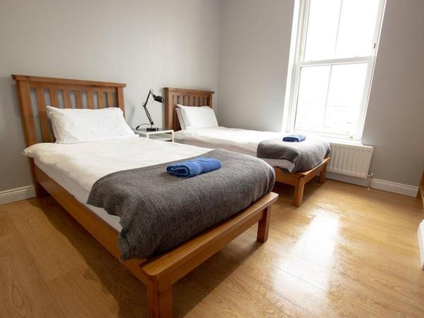 Modern City Centre Rooms : photo 7 de la chambre chambre lits jumeaux