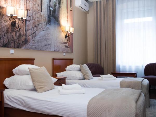 Hotel Wenecki : photo 2 de la chambre chambre lits jumeaux