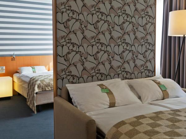 Holiday Inn Vienna City, an IHG Hotel : photo 6 de la chambre suite lit king-size avec canapé-lit