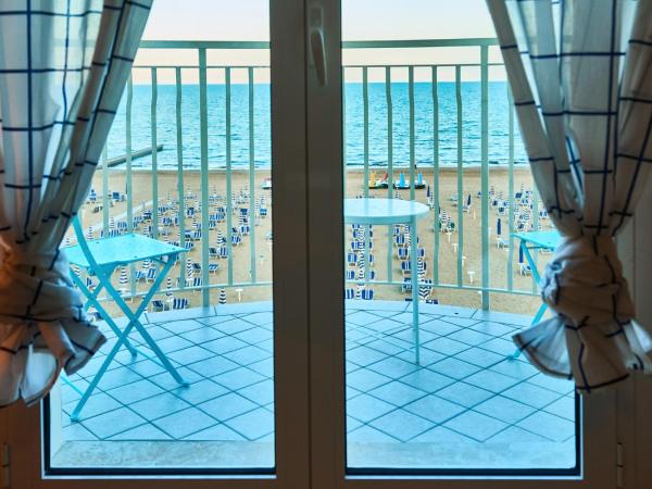 Hotel Concordia : photo 5 de la chambre chambre quadruple - vue sur mer