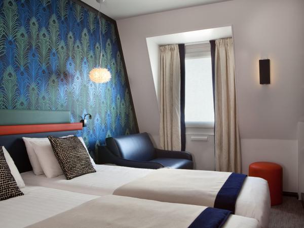 Hotel Yllen Eiffel : photo 1 de la chambre chambre deluxe - lits jumeaux et canapé-lit