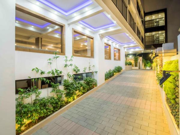 Sidra Pristine Hotel and Portico Halls : photo 2 de la chambre chambre lits jumeaux standard