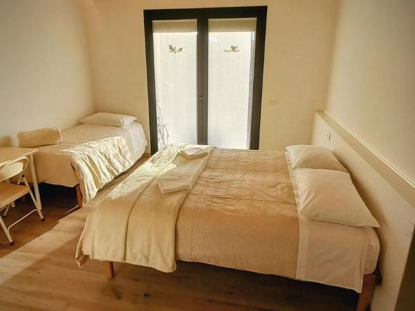 Agriturismo Verdecielo : photo 4 de la chambre chambre triple - vue sur jardin