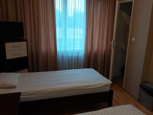 Strzelec Noclegi : photo 6 de la chambre petite chambre lits jumeaux