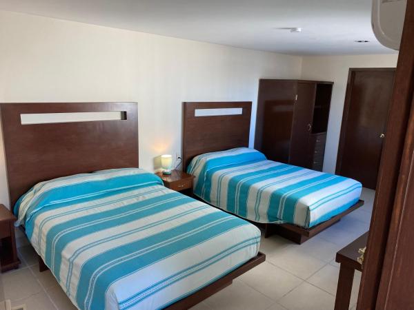 CORDIALITY INN : photo 2 de la chambre chambre lits jumeaux spacieuse