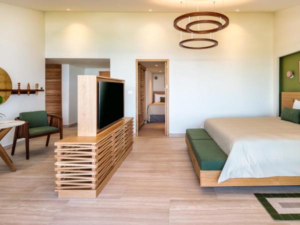 Presidente InterContinental Cozumel Resort & Spa, an IHG Hotel : photo 6 de la chambre suite familiale avec 1 lit king-size et 2 lits doubles - vue sur océan