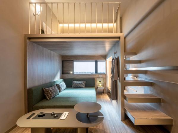 NOA Hotel & SPA Shenzhen : photo 1 de la chambre chambre double avec canapé-lit