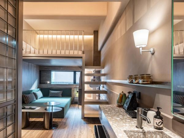 NOA Hotel & SPA Shenzhen : photo 2 de la chambre chambre double avec canapé-lit