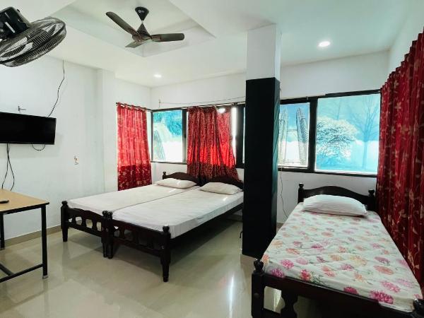 OMAR RESIDENCY : photo 4 de la chambre chambre triple Économique