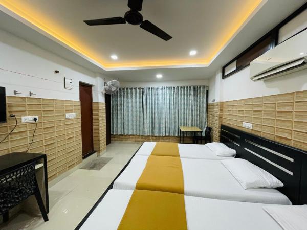 OMAR RESIDENCY : photo 4 de la chambre chambre triple classique