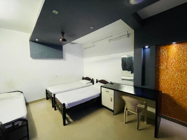 OMAR RESIDENCY : photo 8 de la chambre chambre triple Économique