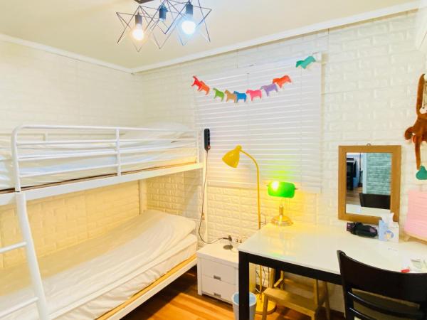 Aroha Guesthouse Seoul Station : photo 3 de la chambre chambre lits jumeaux