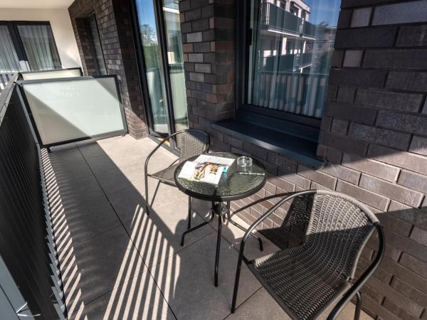 Aparthotel InPoint Cracow G15 - Free Underground Parking : photo 10 de la chambre appartement avec balcon