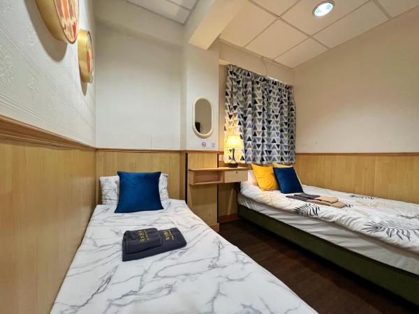 利園賓館 : photo 3 de la chambre chambre triple confort