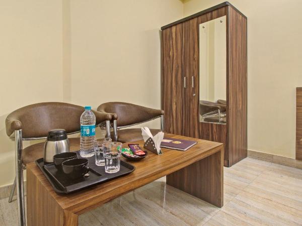 Treebo Rama Hindustani : photo 6 de la chambre chambre double deluxe