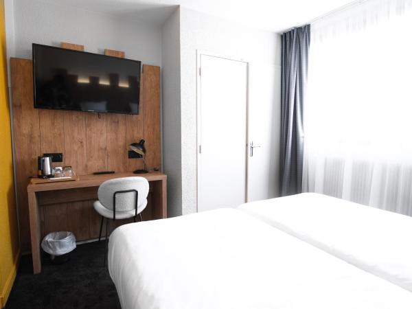 Hôtel Les 2 Alpes L'Orée Des Pistes : photo 2 de la chambre chambre double