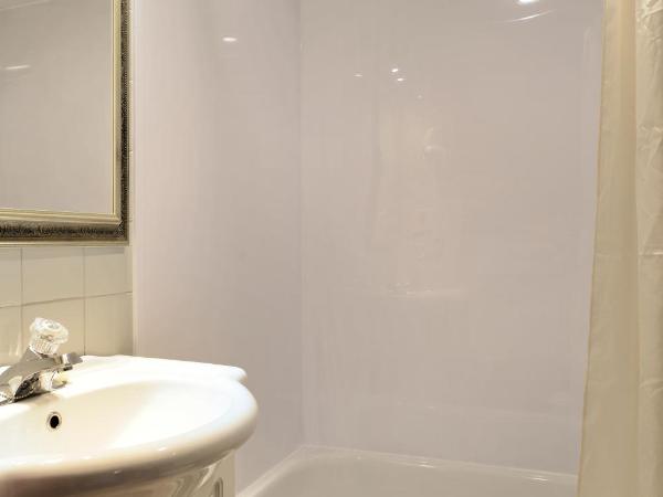Hôtel Manoir de l'Esplanade : photo 8 de la chambre chambre lit king-size deluxe