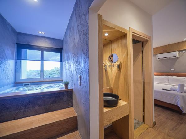 Anixi Hotel by AP : photo 5 de la chambre suite with hot tub & mountain view