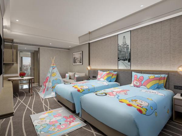 Crowne Plaza Shanghai Nanjing Road, an IHG Hotel : photo 2 de la chambre hébergement lit king-size premium avec canapé-lit - thème enfants