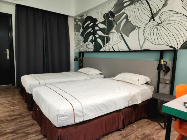 K Hotel : photo 1 de la chambre chambre lits jumeaux deluxe