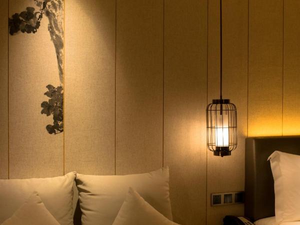 The Garden Hotel Guangzhou - Free shuttle between hotel and Exhibition Center during Canton Fair & Exhibitor registration Counter : photo 5 de la chambre chambre lits jumeaux premier