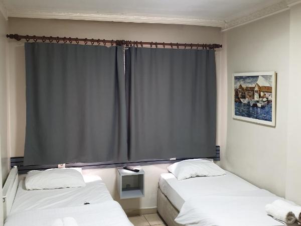 Stad Pansiyon AİLE : photo 1 de la chambre chambre lits jumeaux