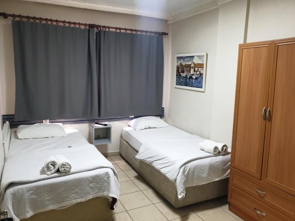 Stad Pansiyon AİLE : photo 2 de la chambre chambre lits jumeaux