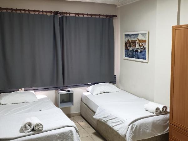 Stad Pansiyon AİLE : photo 3 de la chambre chambre lits jumeaux