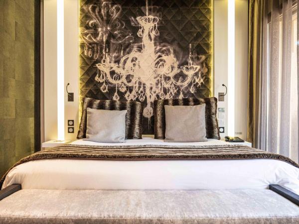 Hôtel Le Parc - La Table de Franck Putelat : photo 2 de la chambre suite junior avec bain à remous extérieur privatif