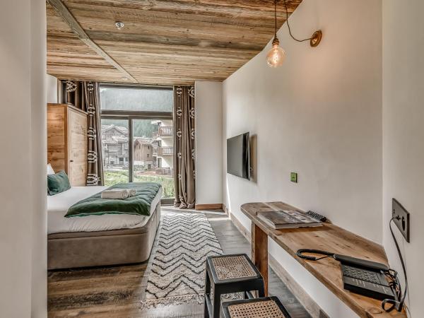 Hotel & Spa Le Val d'Isère : photo 6 de la chambre appartement 2 chambres avec mezzanine ouverte - 7 adultes