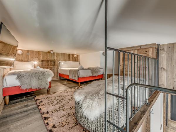 Hotel & Spa Le Val d'Isère : photo 8 de la chambre appartement 2 chambres avec mezzanine ouverte - 7 adultes